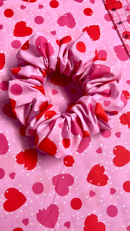 Pink cotton with red hearts